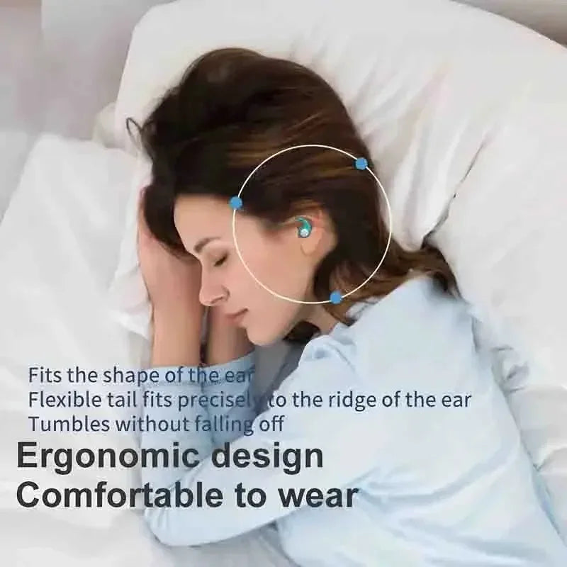 A woman asleep on her side on a white pillow, wearing a turquoise soft silicone sleep earplug