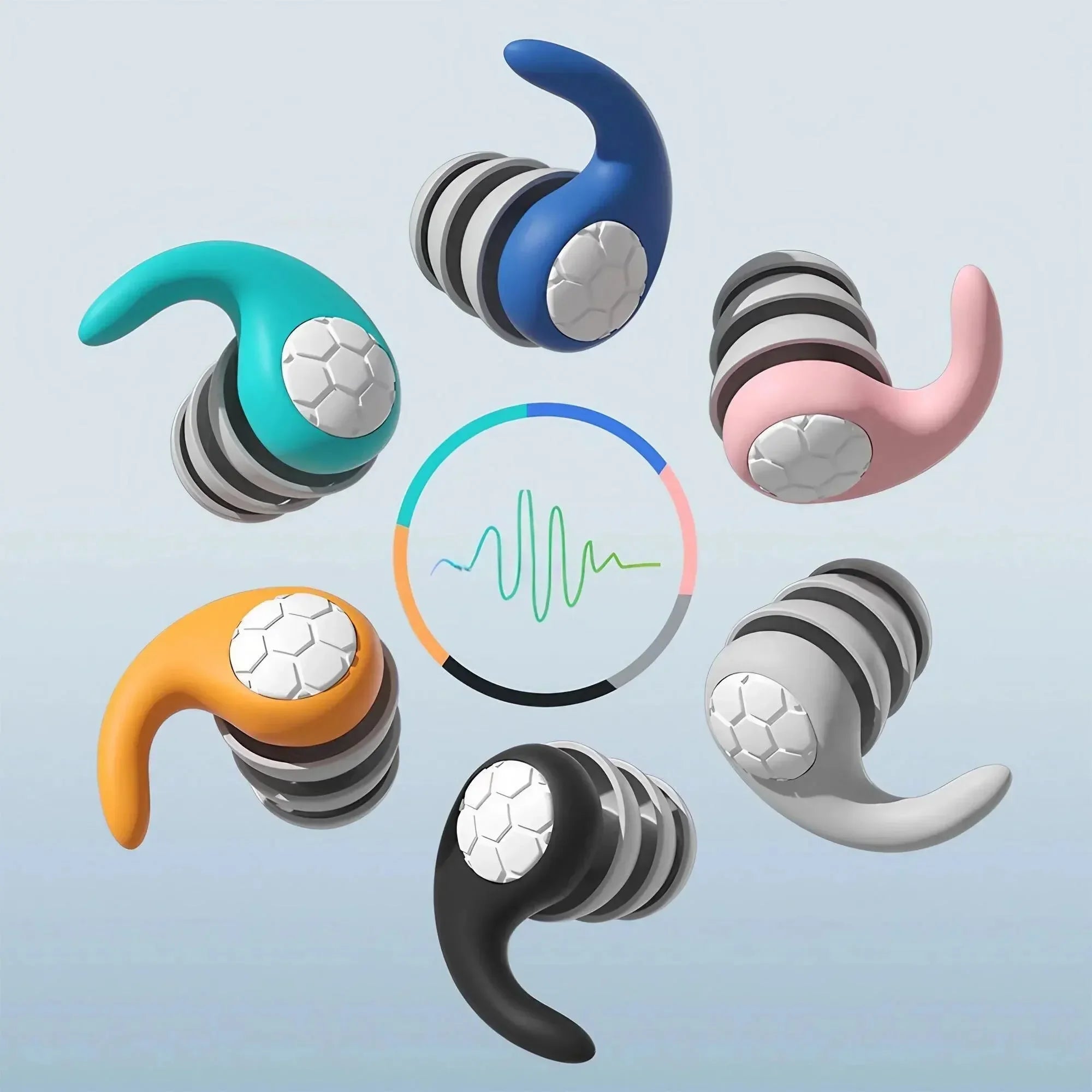 Soft silicone sleep earplugs arranged in a circle in blue, turquoise, pink, orange, grey, black and white