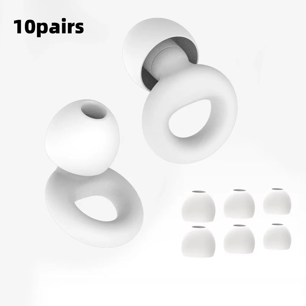 Ten pairs of white silicone earplugs shown with spare white ear caps