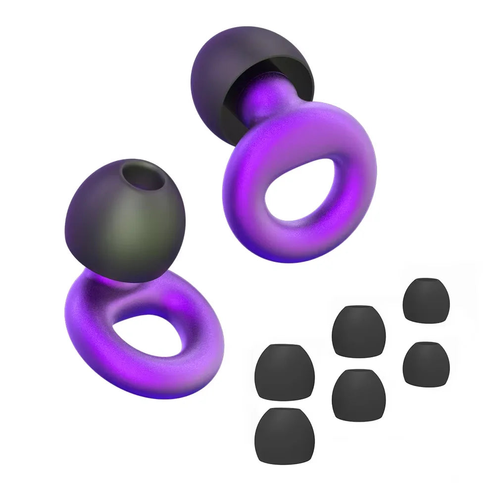 Purple reusable silicone earplugs shown with black spare tips